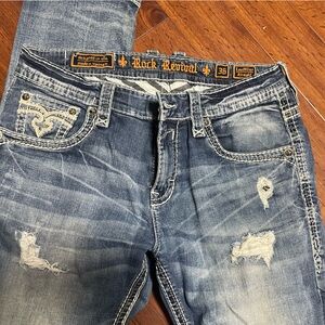Rock Revival Denim with Orange Logo Patch and Striped Liner